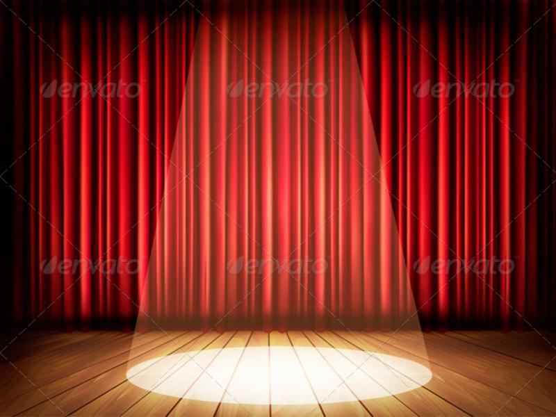 Theater Stage With A Red Curtain and A Spotlight Photo Backgrounds