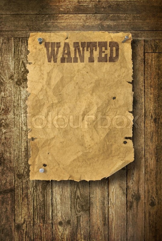Wild West Wanted Poster On Old Wooden Wall Slides